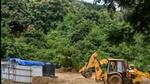 Mumbai, India - September 12, 2018: Trenches dug and land leveled using mud for construction of car shed near unit 19 Aarey for Metro III project (Colaba-Bandra-SEEPZ). Environmentalists claim this in violation of Supreme Court and National Green Tribunal stay order on tree felling, debris dumping and land reclamation in Aarey in Mumbai, India, on Wednesday, September 12, 2018. (Photo by Satyabrata Tripathy/ Hindustan Times) (Hindustan Times) Mumbai, India - September 12, 2018: Trenches dug and land leveled using mud for construction of car shed near unit 19 Aarey for Metro III project (Colaba-Bandra-SEEPZ). Environmentalists claim this in violation of Supreme Court and National Green Tribunal stay order on tree felling, debris dumping and land reclamation in Aarey in Mumbai, India, on Wednesday, September 12, 2018. (Photo by Satyabrata Tripathy/ Hindustan Times) (Hindustan Times)