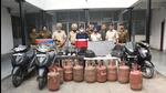 The accused with stolen items recovered from him in Chandigarh Police custody on Wednesday. (HT Photo) The accused with stolen items recovered from him in Chandigarh Police custody on Wednesday. (HT Photo)