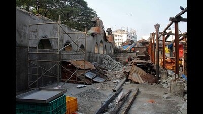 Renovation work underway at the British-era Chhatrapati Shivaji Market in Camp on Wednesday. Last year, 25 shops located at the market were gutted in a massive fire. (Ravindra Joshi/HT PHOTO)