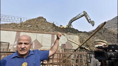 Delhi deputy chief minister Manish Sisodia visits the Ghazipur landfill on Wednesday. He said the BJP has turned the capital into a garbage dump. Sanitation has become major issue ahead of the MCD elections in Delhi. (Sanjeev Verma/HT Photo) Delhi deputy chief minister Manish Sisodia visits the Ghazipur landfill on Wednesday. He said the BJP has turned the capital into a garbage dump. Sanitation has become major issue ahead of the MCD elections in Delhi. (Sanjeev Verma/HT Photo)