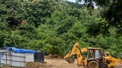 Mumbai, India - September 12, 2018: Trenches dug and land leveled using mud for construction of car shed near unit 19 Aarey for Metro III project (Colaba-Bandra-SEEPZ). Environmentalists claim this in violation of Supreme Court and National Green Tribunal stay order on tree felling, debris dumping and land reclamation in Aarey in Mumbai, India, on Wednesday, September 12, 2018. (Photo by Satyabrata Tripathy/ Hindustan Times) (Hindustan Times) Mumbai, India - September 12, 2018: Trenches dug and land leveled using mud for construction of car shed near unit 19 Aarey for Metro III project (Colaba-Bandra-SEEPZ). Environmentalists claim this in violation of Supreme Court and National Green Tribunal stay order on tree felling, debris dumping and land reclamation in Aarey in Mumbai, India, on Wednesday, September 12, 2018. (Photo by Satyabrata Tripathy/ Hindustan Times) (Hindustan Times)
