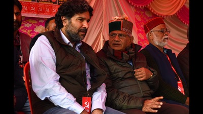 CPIM candidate from Shimla urban Tikender Panwar talking with CPIM national general secretary Sitaram Yechury during the CPIM rally ahead of Himachal Pradesh Assembly elections in Sabzi Mandi ground, Shimla on Wednesday. (Deepak Sansta/HT)