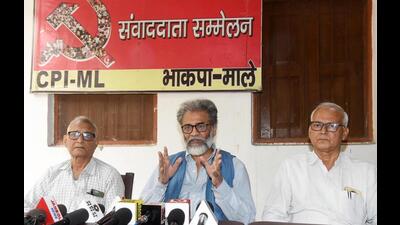 CPI-ML general secretary Dipankar Bhattacharya addresses a press conference in Patna on Wednesday. (Santosh Kumar/HT Photo)