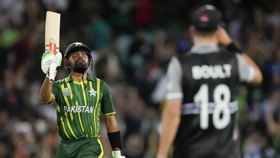 Pakistan's Babar Azam gestures with his bat on scoring 50 runs during the T20 World Cup cricket semifinal between New Zealand and Pakistan in Sydney, Australia, Wednesday, Nov. 9, 2022. (AP Photo/Rick Rycroft) (AP) Pakistan's Babar Azam gestures with his bat on scoring 50 runs during the T20 World Cup cricket semifinal between New Zealand and Pakistan in Sydney, Australia, Wednesday, Nov. 9, 2022. (AP Photo/Rick Rycroft) (AP)