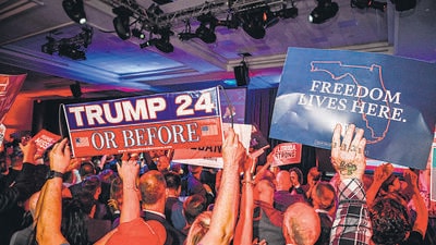 Supporters of Florida Republican gubernatorial candidate Ron DeSantis at an election night watch party in Tampa on Monday (AFP) Supporters of Florida Republican gubernatorial candidate Ron DeSantis at an election night watch party in Tampa on Monday (AFP)