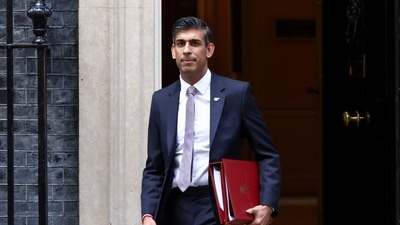 British Prime Minister Rishi Sunak walks outside Number 10 Downing Street, in London, Britain, Wednesday. (REUTERS)