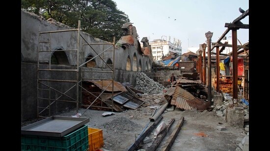 Renovation work underway at the British-era Chhatrapati Shivaji Market in Camp on Wednesday. Last year, 25 shops located at the market were gutted in a massive fire. (Ravindra Joshi/HT PHOTO)