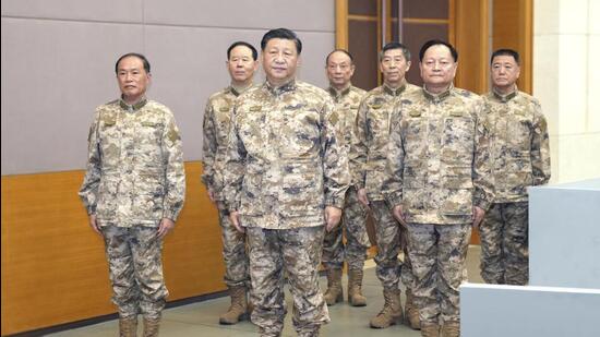 Chinese President Xi Jinping (front centre) inspects the Central Military Commission joint operations command centre in Beijing. (AP)