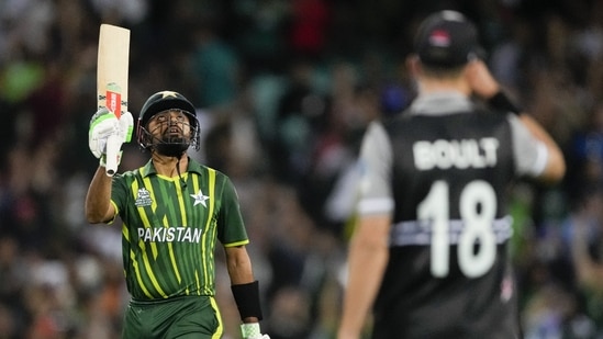 Pakistan's Babar Azam gestures with his bat on scoring 50 runs during the T20 World Cup cricket semifinal between New Zealand and Pakistan in Sydney, Australia, Wednesday, Nov. 9, 2022. (AP Photo/Rick Rycroft)(AP)