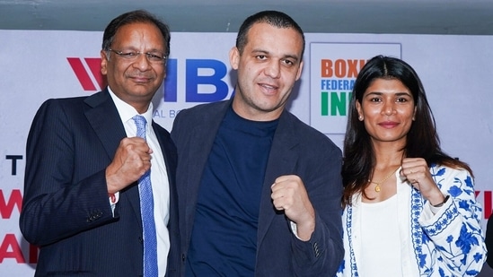  BFI president Ajay Singh, IBA president Umar Kremlev and Reigning world champion Nikhat Zareen