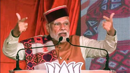 Prime Minister Narendra Modi addressing the BJP rally at Chambi in Shahpur constituency of Kangra district on Wednesday. (PTI Photo)