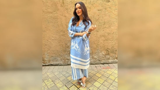 Neha Dhupia's silk kurta features Mandana print. The set is available on the official website of the label in all sizes.(Instagram/@nehadhupia)