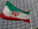 An Iranian flag flutters.