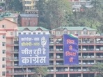 The posters dotting capital Shimla ahead of Himachal Pradesh Assembly elections, in Shimla. (HT Photo)