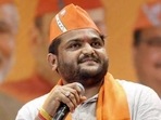 Hardik Patel, who spearheaded a massive Patidar quota agitation in the state in 2015, quit the Congress and joined the BJP in June this year. (PTI File Photo) Hardik Patel, who spearheaded a massive Patidar quota agitation in the state in 2015, quit the Congress and joined the BJP in June this year. (PTI File Photo)
