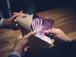 The Panchayat Development department have been demanding lakhs of rupees as bribe to clear paperwork for their property. (Getty Images/iStockphoto) The Panchayat Development department have been demanding lakhs of rupees as bribe to clear paperwork for their property. (Getty Images/iStockphoto)
