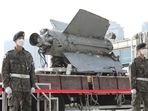 North Korea: South Korean army soldiers stand in front of the debris of a missile. North Korea: South Korean army soldiers stand in front of the debris of a missile.