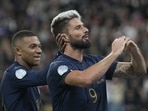 France's Olivier Giroud, right(AP)