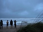 Hurricane Nicole: People brave rain and strong winds to visit Jensen Beach. Hurricane Nicole: People brave rain and strong winds to visit Jensen Beach.