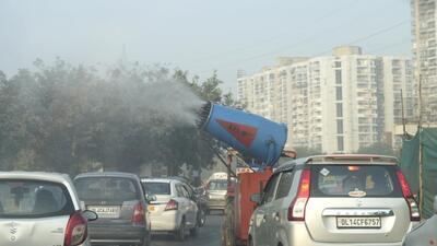 An anti-amog gun on a modified vehicle being used to spray water to curb pollution in New Delhi. (PTI) An anti-amog gun on a modified vehicle being used to spray water to curb pollution in New Delhi. (PTI)