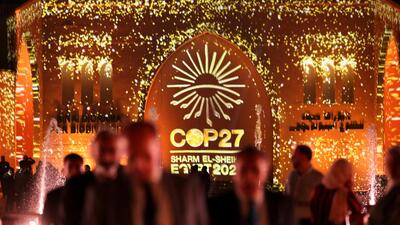 People pass in front of a wall lit with the sign of COP27 as the COP27 climate summit takes place, at the Green Zone in Sharm el-Sheikh, Egypt November 10, 2022. REUTERS/Mohamed Abd El Ghany (REUTERS) People pass in front of a wall lit with the sign of COP27 as the COP27 climate summit takes place, at the Green Zone in Sharm el-Sheikh, Egypt November 10, 2022. REUTERS/Mohamed Abd El Ghany (REUTERS)