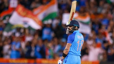 Kohli celebeates his half century. (AP) Kohli celebeates his half century. (AP)