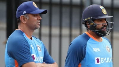 India's captain Rohit Sharma (R) and head coach Rahul Dravid (AFP)