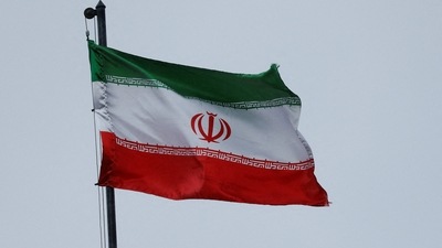 Iran Hypersonic Ballistic Missile: Iranian flag waves in the wind over a building. (Reuters File)