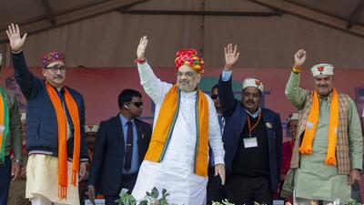 Union home minister Amit Shah and BJP candidate from Sulah assembly segment Vipin Singh Parmar (left) at an election rally in Palampur of Himachal Pradesh on Thursday. (ANI Photo) Union home minister Amit Shah and BJP candidate from Sulah assembly segment Vipin Singh Parmar (left) at an election rally in Palampur of Himachal Pradesh on Thursday. (ANI Photo)