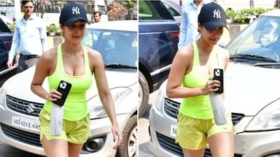 Malaika Arora aces gym fashion in a neon green tank top and shorts set. (HT Photo/Varinder Chawla) Malaika Arora aces gym fashion in a neon green tank top and shorts set. (HT Photo/Varinder Chawla)