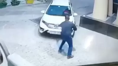 Rape accused hits security guard with car in Noida society, flees | Video (ANI) Rape accused hits security guard with car in Noida society, flees | Video (ANI)
