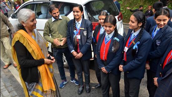 Union finance minister Nirmala Sitharaman interacts with students in Shimla on Thursday. (Deepak Sansta/HT)