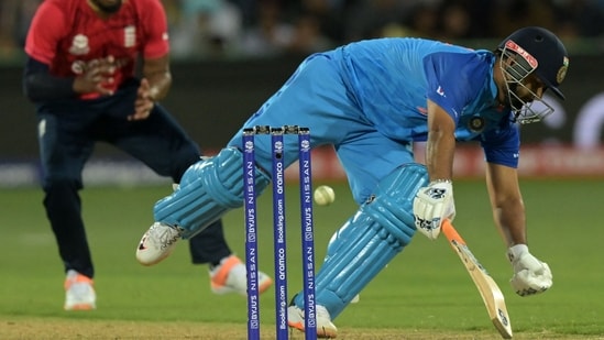 Rishabh Pant falls while playing a shot during the T20 World Cup 2022 semi-final(AFP)
