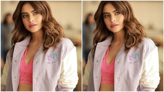Aamna embraced the Mumbai weather in a pastel pink laced corset cropped top, and teamed it with a white pencil skirt with black borders. (Instagram/@aamnasharifofficial)