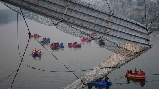 Amrutia reportedly jumped into the river wearing a life tube to save the lives of the people, news agency ANI said.(AP)