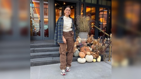 Mrunal Thakur amped up her look by teaming her look with a cool pair of kicks.(Instagram/@mrunalthakur)