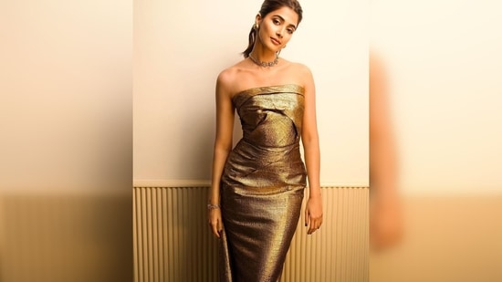Pooja Hegde's outfit is worth almost a lakh. As per the official website, the gown costs $1,199.52 ( <span class='webrupee'>₹</span>98,037.37).(Instagram/@tanghavri)