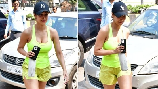 Malaika Arora aces gym fashion in a neon green tank top and shorts set. (HT Photo/Varinder Chawla)