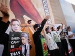 Climate activists of the BTS army protest against climate change at the Sharm El-Sheikh International Convention Centre, during the COP27 climate summit, in Sharm el-Sheikh, Egypt, Thursday.(REUTERS)