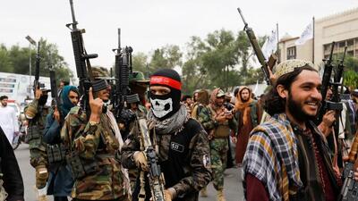 Taliban fighters celebrate the first anniversary of the fall of Kabul on a street in Kabul, Afghanistan (REUTERS) Taliban fighters celebrate the first anniversary of the fall of Kabul on a street in Kabul, Afghanistan (REUTERS)
