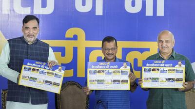 Delhi chief minister Arvind Kejriwal releasing AAP’s guarantees ahead of MCD polls. (PTI) Delhi chief minister Arvind Kejriwal releasing AAP’s guarantees ahead of MCD polls. (PTI)