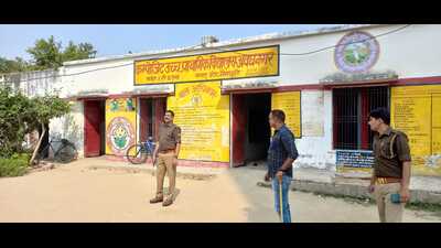Police officials assessing a polling centre in Mainpuri on Friday. (HT Photo) Police officials assessing a polling centre in Mainpuri on Friday. (HT Photo)