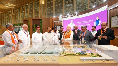 PM Modi with Union minister Pralhad Joshi, Governor Thaawarchand Gehlot, CM Basavaraj Bommai, and former chief minister BS Yediyurappa at the Terminal 2 of Kempegowda International Airport. (PTI)