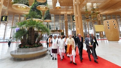 Prime Minister Narendra Modi with Union minister Pralhad Joshi, Karnataka Governor Thaawarchand Gehlot, and others at the newly-inaugurated Terminal 2 of Kempegowda International Airport in Bengaluru. (PTI)