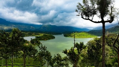 Munnar is perfect for a romantic getaway and having a honeymoon full of tranquilly, bliss, and solitude when one is surrounded by lush green valleys and beautiful flowing backwaters. Take a boat trip on Kundala Lake or simply spend a lot of time admiring Attukad Waterfalls' magnificence. It's unquestionably a paradise for honeymooners to deepen their relationship as they enter this great stage of life. If you're seeking a honeymoon trip in God's own country, Munnar needs to be your top choice. (Unsplash) Munnar is perfect for a romantic getaway and having a honeymoon full of tranquilly, bliss, and solitude when one is surrounded by lush green valleys and beautiful flowing backwaters. Take a boat trip on Kundala Lake or simply spend a lot of time admiring Attukad Waterfalls' magnificence. It's unquestionably a paradise for honeymooners to deepen their relationship as they enter this great stage of life. If you're seeking a honeymoon trip in God's own country, Munnar needs to be your top choice. (Unsplash)