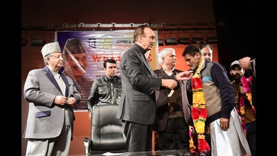 Democratic Azad Party (DAP) chairman Ghulam Nabi Azad welcoming various leaders into the party fold at a function in which J&K Democratic Peace Movement (JKDPM) merged with DAP in Srinagar on Friday. (ANI)