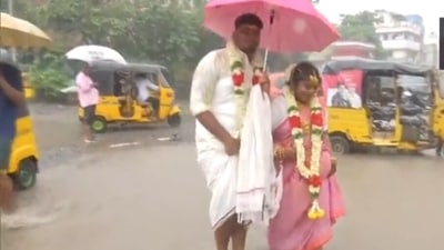 According to the news agency, five weddings, which were scheduled months ago, were supposed to take place at the city's Anjineyar temple, but had to be delayed due to the rainfall. (ANI)