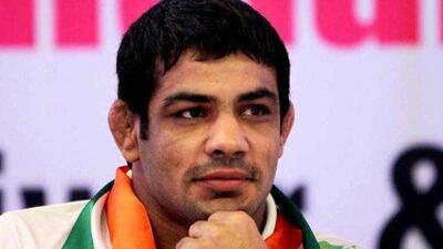 Wrestler Sushil Kumar, who will hold the Indian flag in London Olympics 2012, during a send-off function ahead of the mega event, in New Delhi. PTI/Vijay Verma