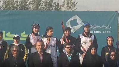 A video of an Iranian athlete, archer Parmida Ghasemi has gone viral as she is hailed for her 'courage' to show support for anti-hijab protests in the country. (Twitter/@AlinejadMasih)