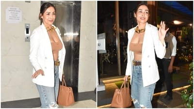 Malaika Arora makes a stylish appearance in a bralette, distressed jeans and blazer. (HT Photo/Varinder Chawla) Malaika Arora makes a stylish appearance in a bralette, distressed jeans and blazer. (HT Photo/Varinder Chawla)